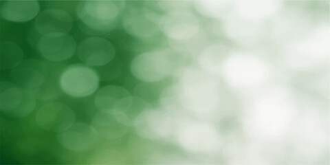 Green abstract bokeh background with bright glowing lights and festive holiday design pattern