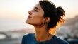 © Nataliya - Woman enjoying sunset with her eyes closed and a peaceful expression