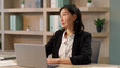 © Yuliia - Thoughtful businesswoman Asian adult business person woman leader manager chinese korean girl japanese employer think contemplate female entrepreneur online work office smiling happy looking at camera