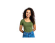 © Fridocha - Smiling young woman with long curly hair wearing a green tshirt and blue jeans posing with hands behind her back.