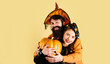 © Volodymyr - Romantic and love. Halloween couple embracing. Halloween couple with pumpkin and Halloween makeup. Man and woman in witch hat celebrating Halloween.
