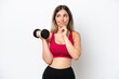 © luismolinero - Young sport Rumanian woman making weightlifting isolated on white background having doubts and thinking