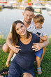 © Sunshine - Happy Family Enjoying Quality Time Together by the Marina