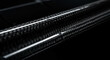 © Saiful Islam Wasif - Glossy carbon fiber texture detail. Macro shot of black woven composite material, representing strength and modern technology.