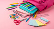 © PictoAi - Pink backpack spills open, revealing an assortment of colorful stationery items. All arranged on a soft pink background.