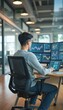 © natakot - Focused young man analyzing data on multiple screens