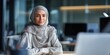 © Inna - Confident Muslim Female Entrepreneur Working on Digital Technology Project