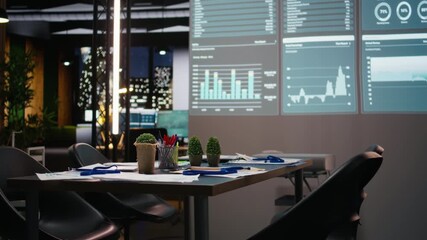 Poster - Professional workspace in a multinational enterprise shows an empty dark office after hours, glowing with data insights, forecasting projections and digital charts for business planning.