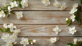 114.A peaceful, serene composition of freshly picked jasmine flowers scattered across a distressed wooden table, with the purity of the white flowers contrasting beautifully with the rustic,