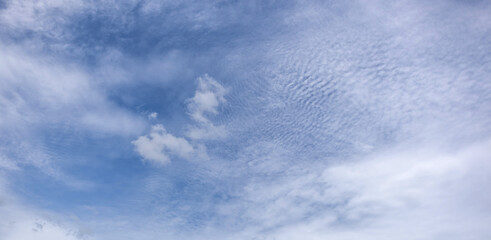 Wall Mural - clear blue sky background,clouds with background, blue sky background with tiny clouds. white fluffy