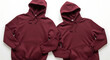 © Sunnn - Two blank maroon pullover hoodie sweatshirts, flat lay apparel design mockup