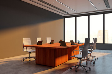 Poster - Modern executive boardroom interior with large wooden desk, white chairs and digital tablets in a high-rise office at sunset with city view. 3D Rendering