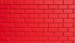 © shopia - Bold crimson brick wall texture with consistent block patterns as modern urban aesthetic