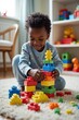 © WoodHunt - A small black boy in pajamas is stacking colorful plastic blocks on a carpet. The room has a window with daylight and shelves filled with toys