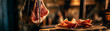 © Дмитрий Соколов - Whole piece of ham and sliced ham slices on a wooden table