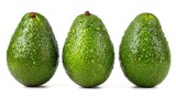 Three avocados, bright green, covered in water droplets, arranged in a horizontal row against a plain white background