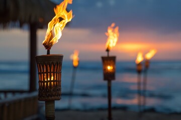 Wall Mural - tropical hawaii celebration: dusk glow of tiki torches on beach with stunning sunset ambiance