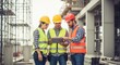 © DigitalSpace - Group of construction professionals using tablet for site inspection.