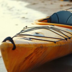 Wall Mural - a lone yellow kayak sits atop a sandy beach, ready for adventure