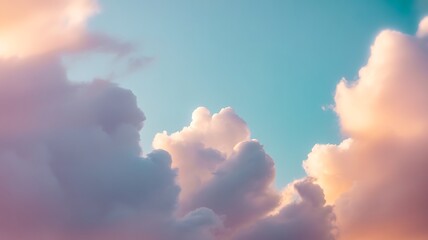 Wall Mural - soft pastel clouds in a turquoise sky with pink and purple hues at sunset dawn