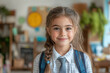 © Zarina - Young girl with long hair, wearing a blue tie.