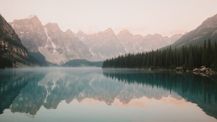  Turquoise Lake Reflecting Pine Forest and Snow- Capped Mountains snow-capped