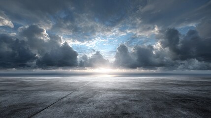 Wall Mural - An expansive view of a cloudy sky is illuminated by a bright horizon at dusk. The smooth surface below reflects the colors of the sky, creating a serene atmosphere.