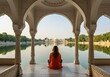 © Habibur - Woman meditating by a serene lake at a historic indian palace