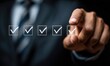 © studio - Businessman's hand selecting checkboxes