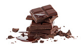 
A pile of chocolate bars with a chocolate drizzle on top
