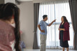 © Jack Tamrong - Girl feeling sad with father and mother arguing, family problem concept