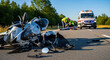 © Ksenia Pestereva - Motorcycle accident with damaged motorbike and ambulance arriving to assist injured person. Scene shows motorcycle accident with emergency responders.