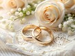 © MdIskandar - Gold wedding rings with cream roses and delicate lace