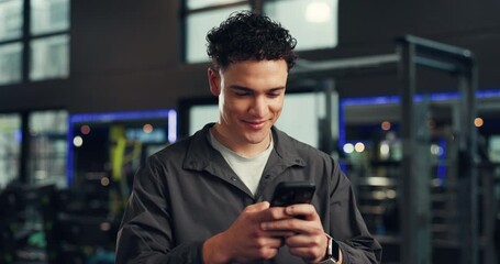 Smile, athlete and man with phone at gym for social media, fitness app and sign up on website. Happy, male person and mobile for research, review progress and online notification of sports membership