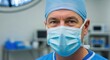 © Ms Vector - Surgeon in blue scrubs and surgical mask ready for operation