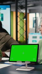 Poster - Vertical Video Diverse women using chroma key mockup for business performance indicators, vision statements related to their company goals. Corporate feminism in a work environment. Camera A.