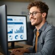 © Natti - Confident and smiling young businessman customer success specialist reviewing realtime user engagemen in a suit and tie works on his laptop in a modern corporate office, embodying professional success