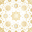 © MdMajlur - Golden and white starburst snowflake pattern on white background seamless winter