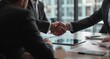 © Luis - Business Handshake Agreement Deal Partnership
