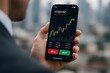 © Andefastudio - Stock Trading Application on Mobile Phone