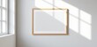 © PatchaStock - Minimalist white poster in wood frame, gray wall, sunlit gallery ,  sunlight,  exhibition