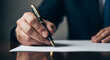© DEDI - Eloquent script: Business professional signing document with fountain pen on wooden table