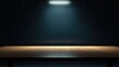 © K99Design - A wooden table with a dark background and a single light source casting a shadow.