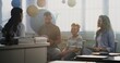 © Framestock - Mother and Father Looking at School Test Grades of Their Son During Parents Evening. Teacher and Parents Happy About Excellent Academic Performance and Behavior of Elementary School Boy. Medium Shot.