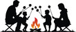 © MdRakibul - A silhouette of a family with two sons roasting marshmallows together over a campfire on a camping trip