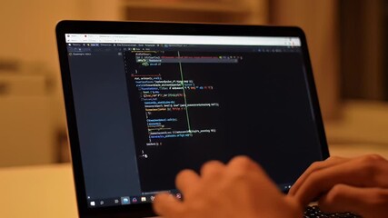 Laptop screen displaying code