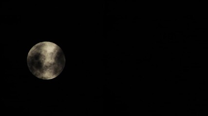 Wall Mural - big bright silver full moon revealing from behind clouds, maffra, gippsland, victoria, australia