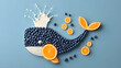 © Yulia - Whale figure made from blueberries, orange slice and yogurt drops, ocean-themed on blue