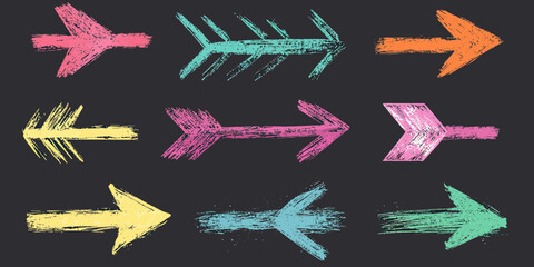 Poster - Collection of colorful chalk hand drawn arrows with rough textured brush strokes and scribble style on dark background for design elements and decorative use