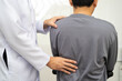 © kanruthai - Physical therapy, Asian therapist doctor treat perform pain young man in hospital.
